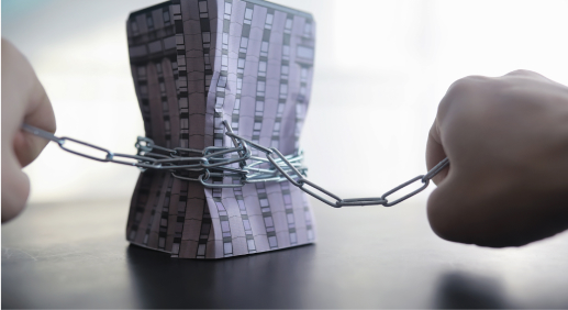 Display of a model of a building that was chained by a man.